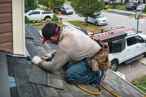 Professional Roofing technician working in De Mossville, KY